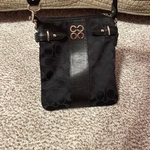 Small black crossbody Coach bag